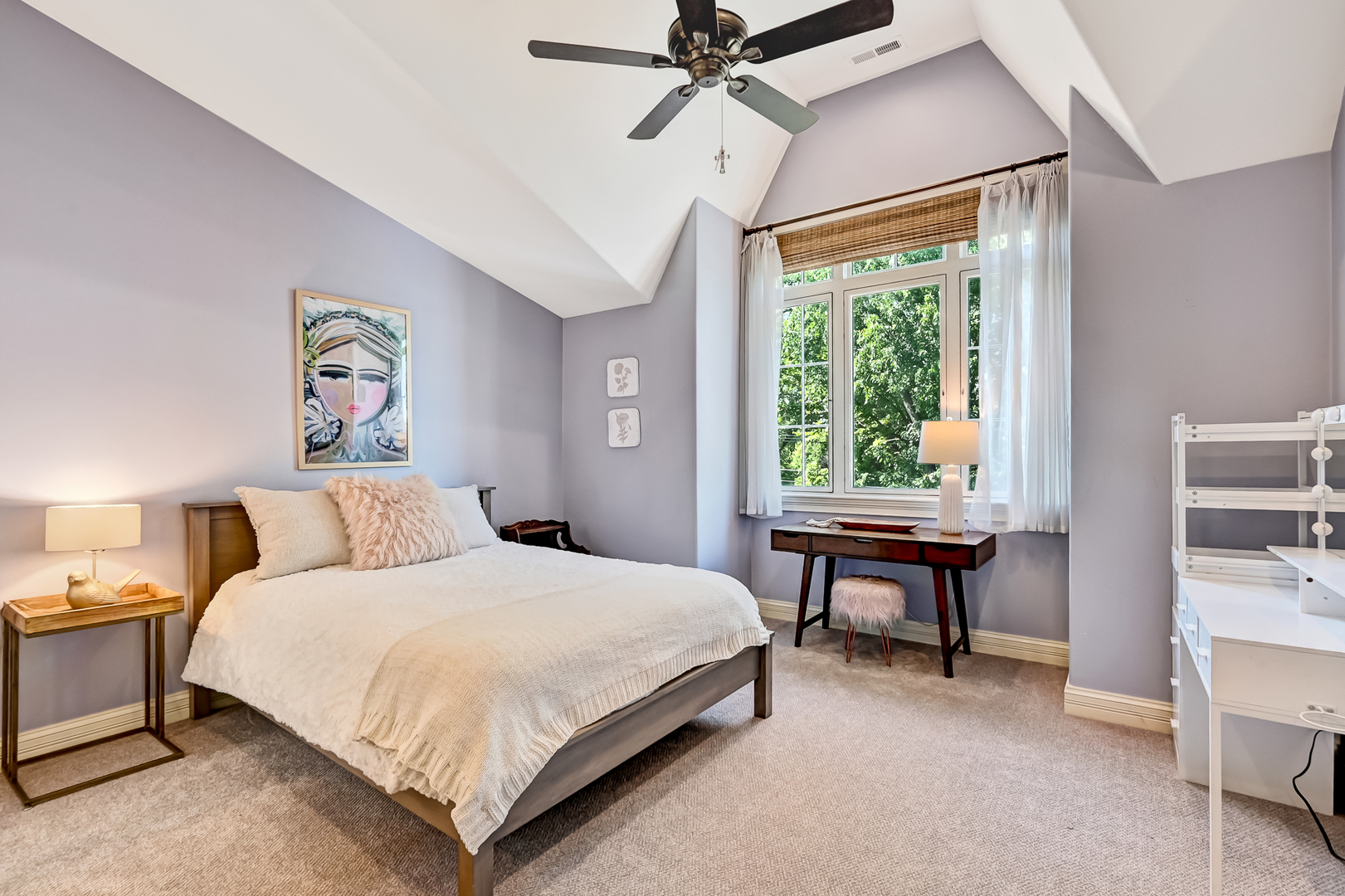 4736 Grand Avenue Western Springs, IL 60558 - Photo 40 of 69 a bedroom with a bed and a chandelier