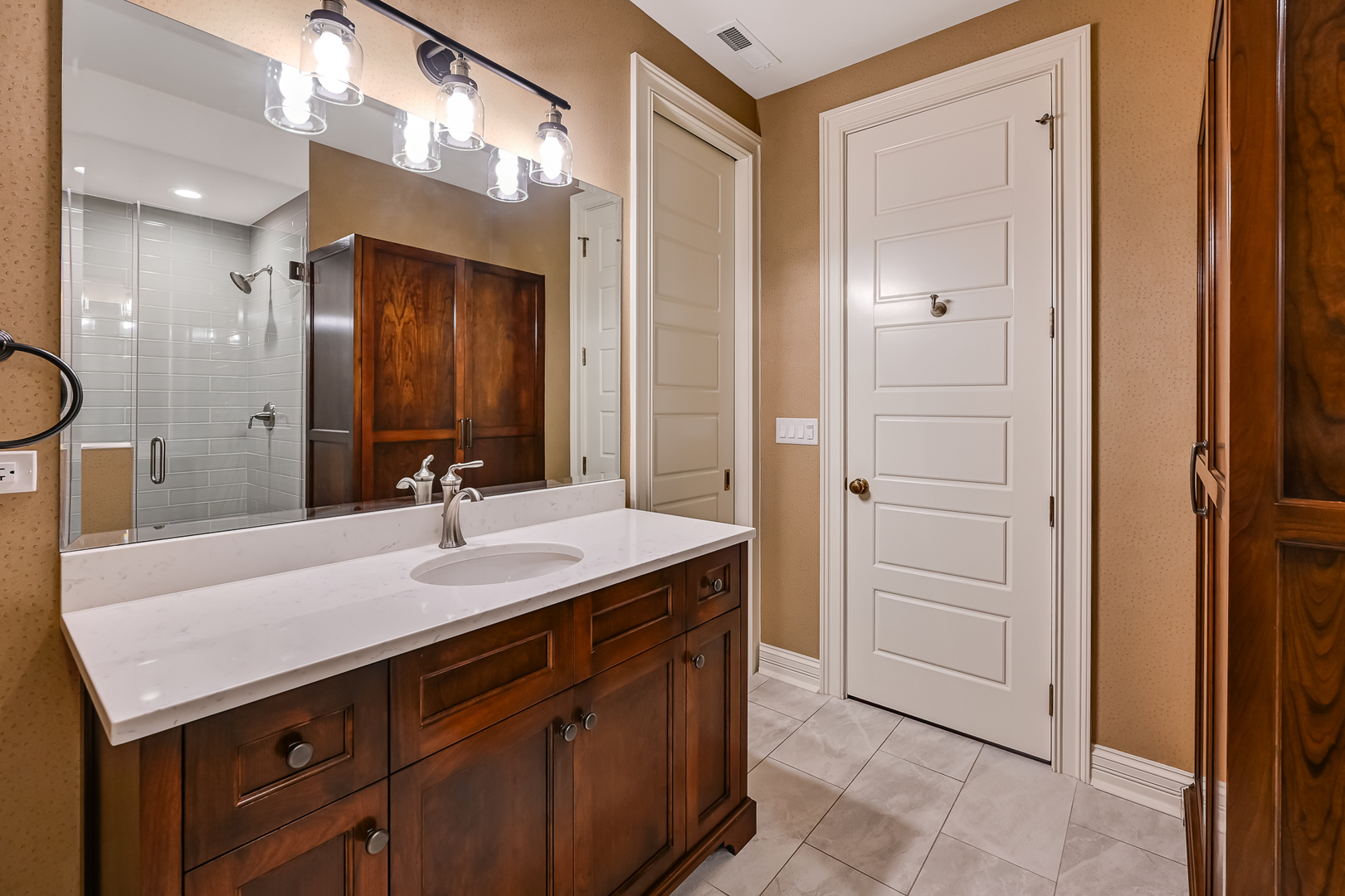 4736 Grand Avenue Western Springs, IL 60558 - Photo 50 of 69 a bathroom with a sink and a mirror