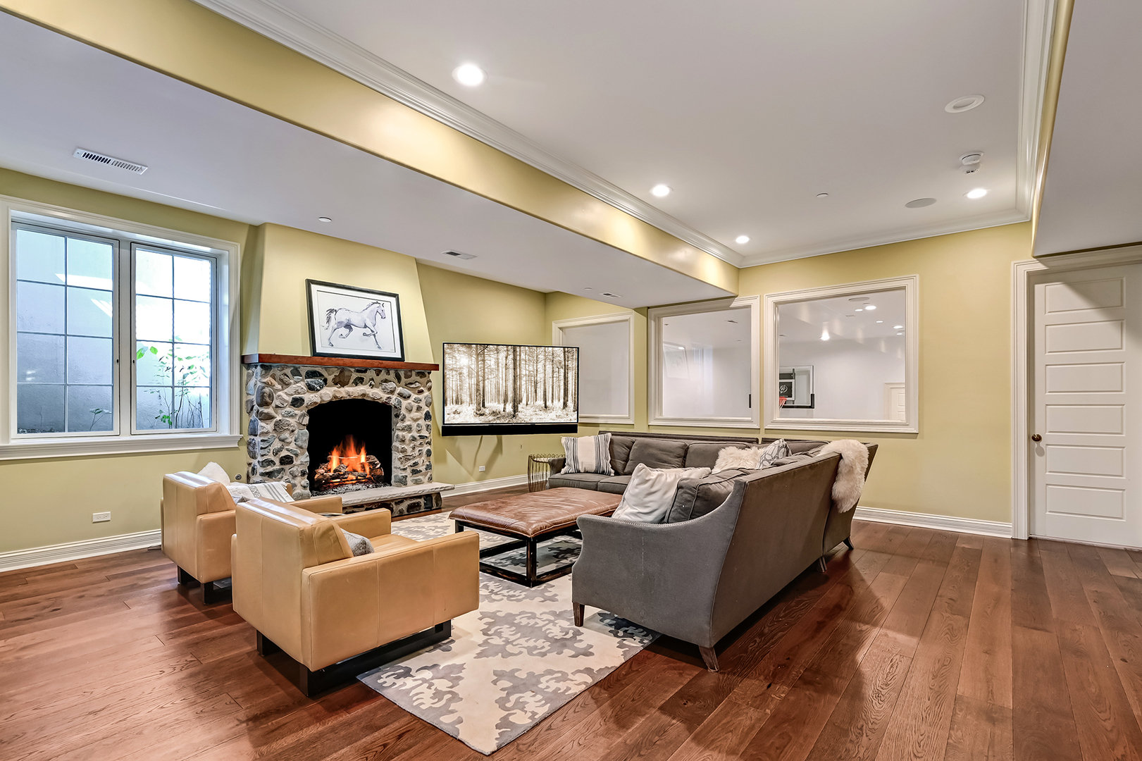 4736 Grand Avenue Western Springs, IL 60558 - Photo 51 of 69 a living room with furniture and a fireplace