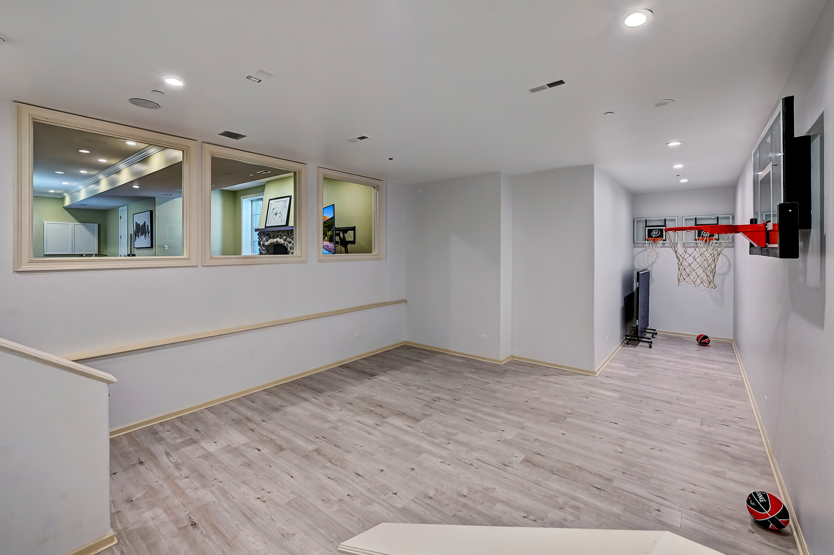 4736 Grand Avenue Western Springs, IL 60558 - Photo 53 of 69 wooden floor in an empty room with a window