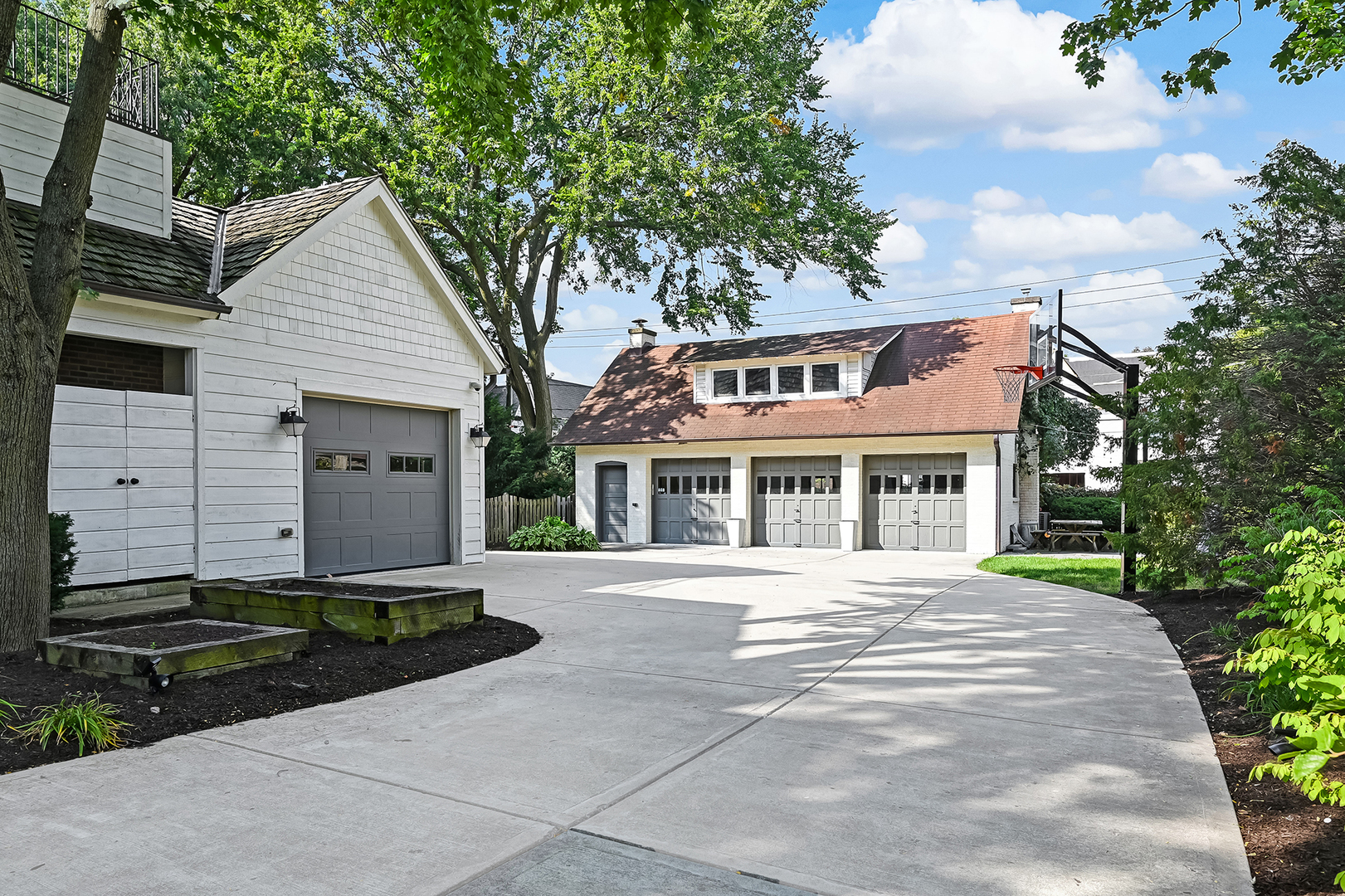 4736 Grand Avenue Western Springs, IL 60558 - Photo 56 of 69 a front view of a house with a yard and trees
