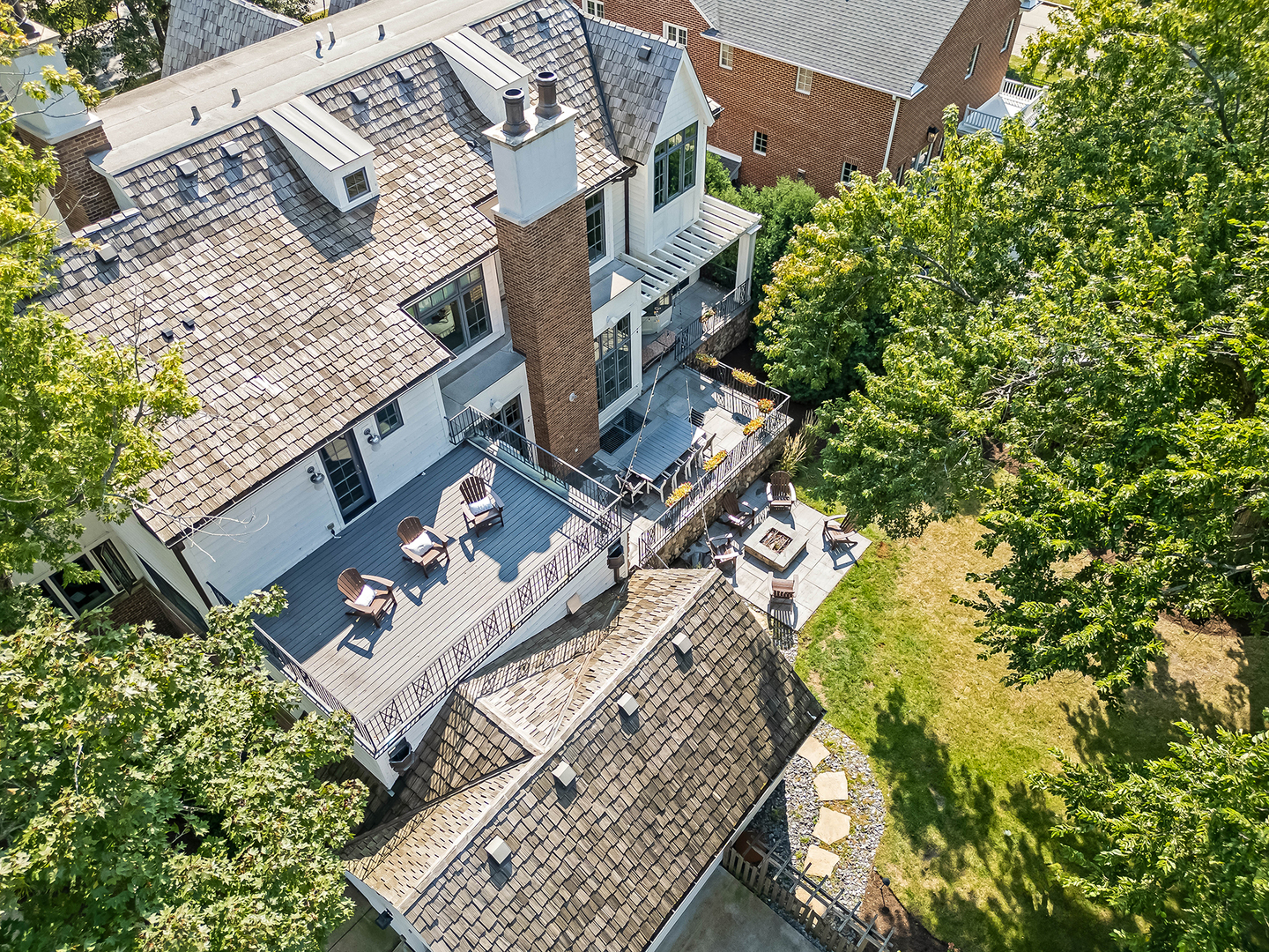 4736 Grand Avenue Western Springs, IL 60558 - Photo 63 of 69 an aerial view of a house with garden space and trees all around
