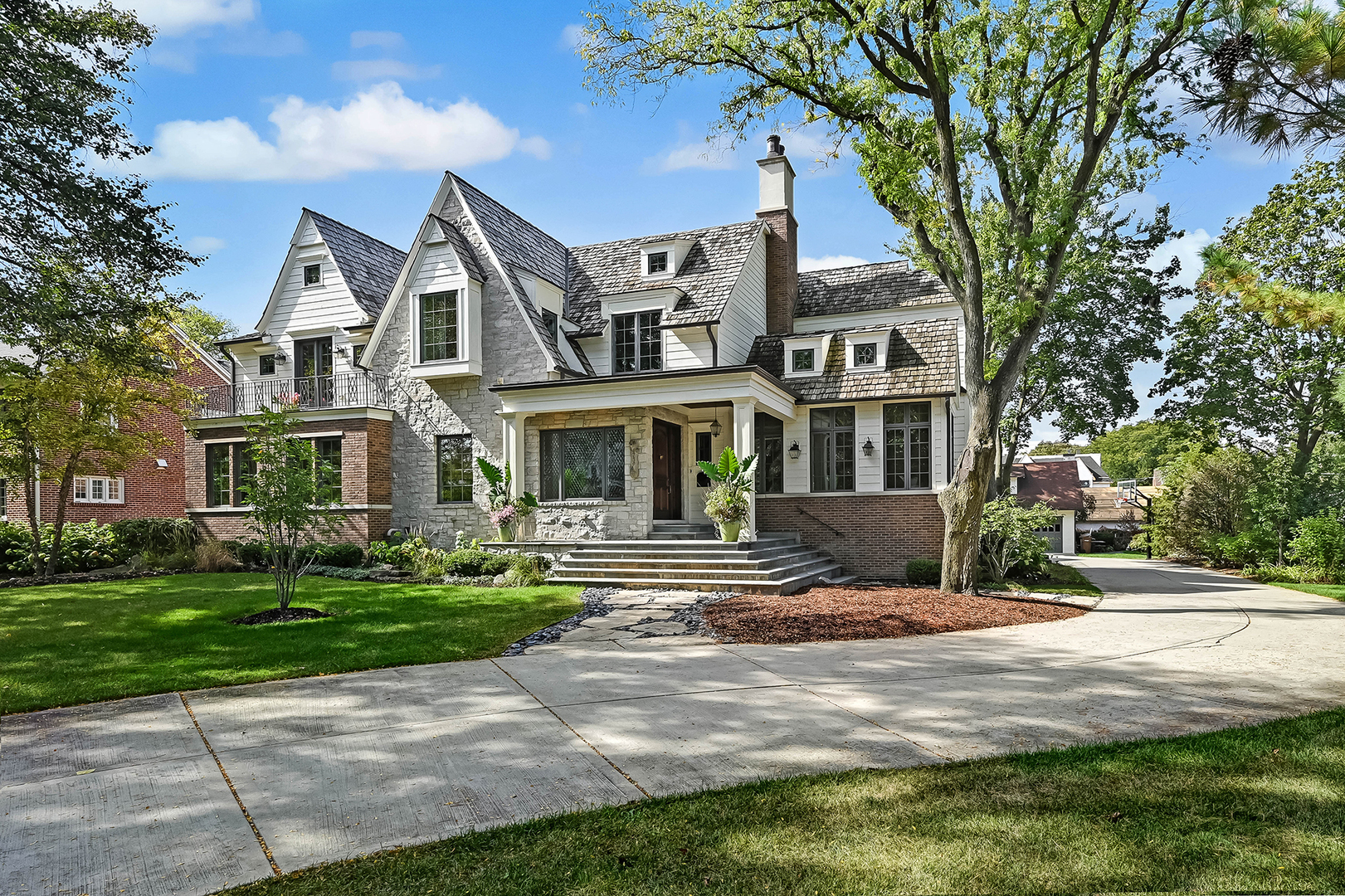 4736 Grand Avenue Western Springs, IL 60558 - Photo 65 of 69 a front view of a house with a yard