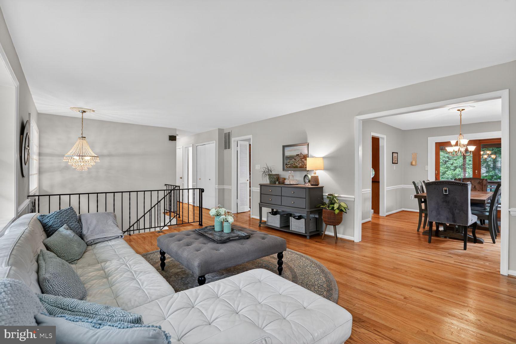 5024 Portsmouth Road Fairfax, VA 22032 - Photo 5 of 38 a living room with furniture and wooden floor