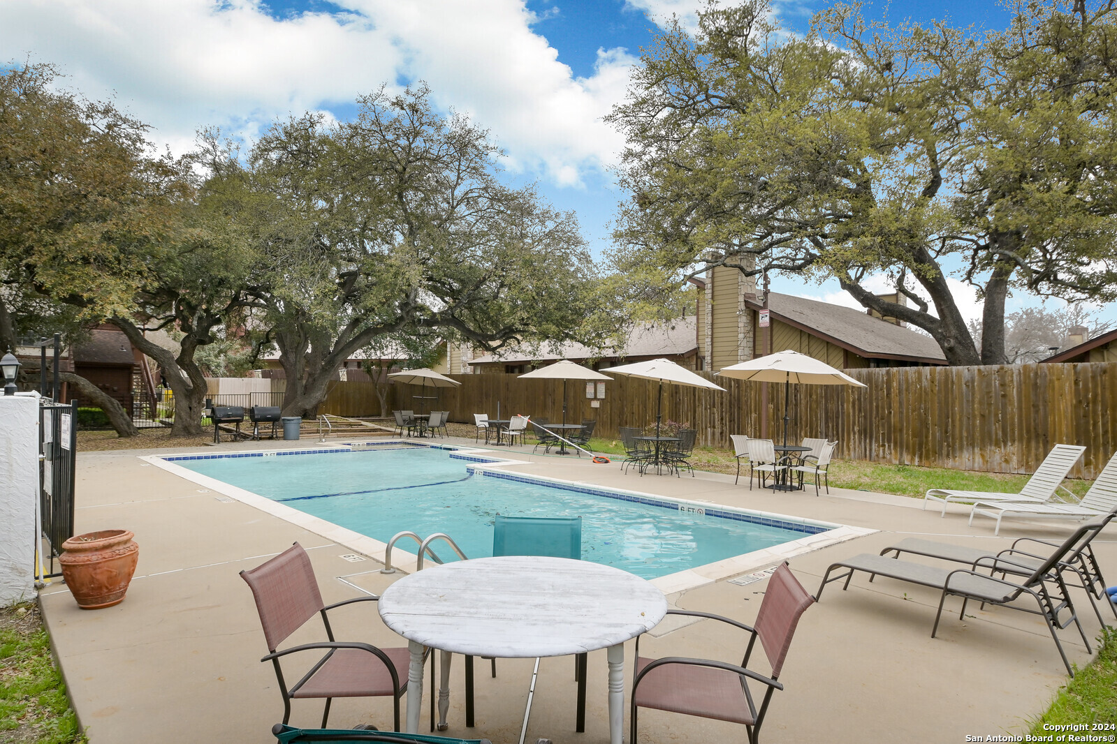 10527 Perrin Beitel Road, Unit A112 San Antonio, TX 78217 - Photo 16 of 16 a view of a backyard with sitting area