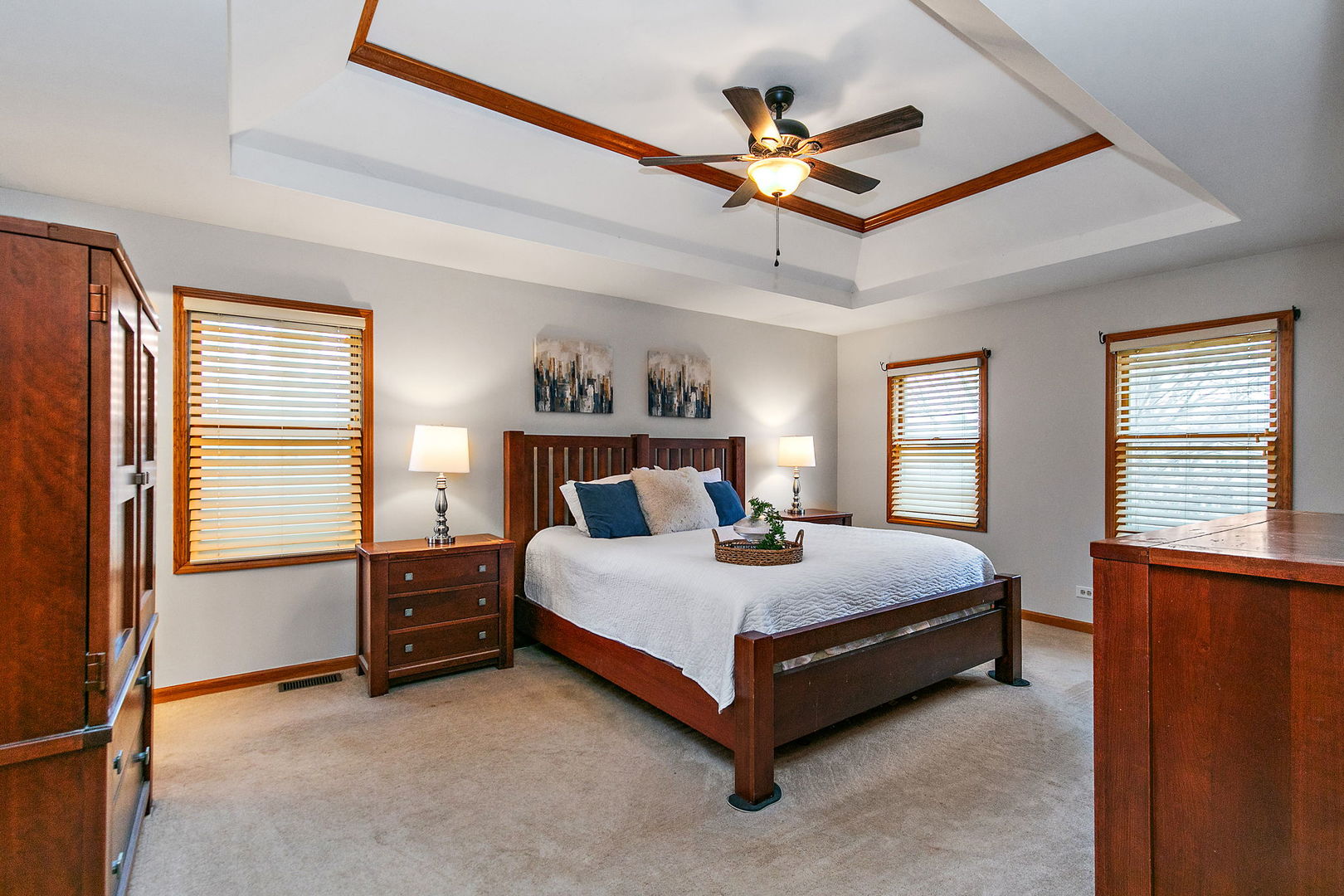 39W462 Baert Road St. Charles, IL 60175 - Photo 17 of 41 a bedroom with a bed and a ceiling fan