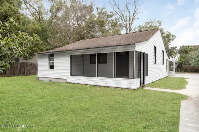 a view of a backyard with a garden