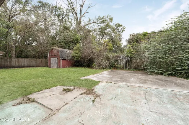 a view of a backyard with a garden