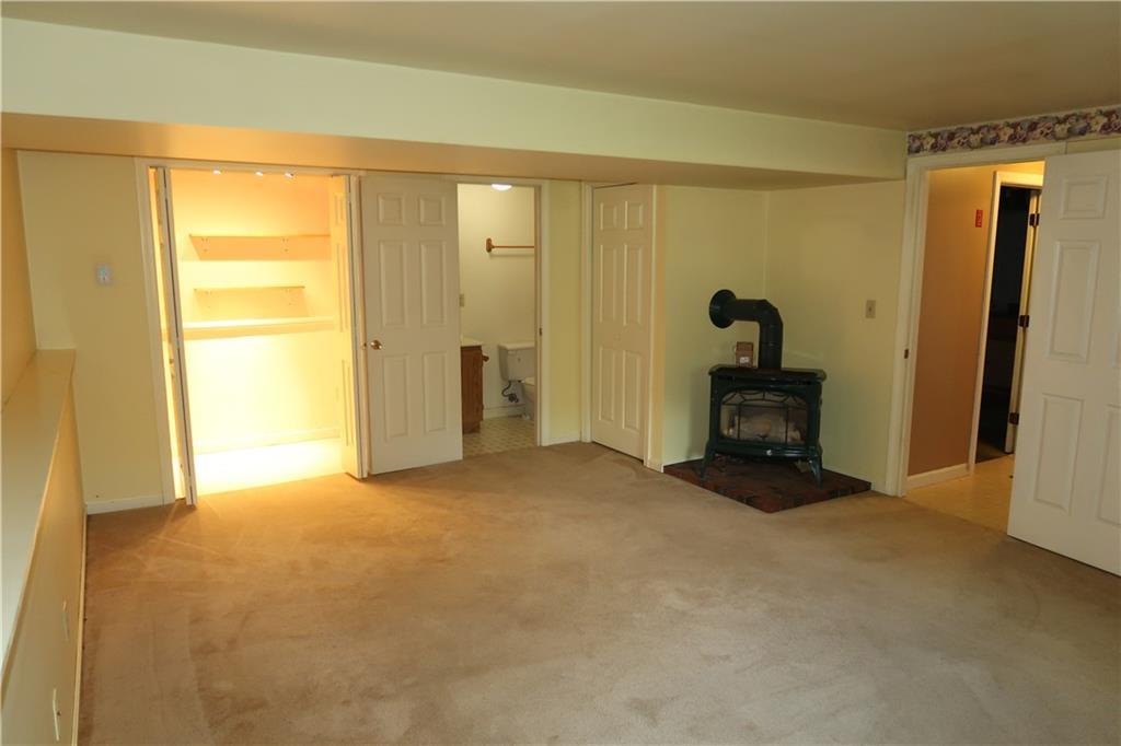 519 Eight Rod Road Augusta, ME 04330 - Photo 25 of 34 Family room with a crafting nook and...