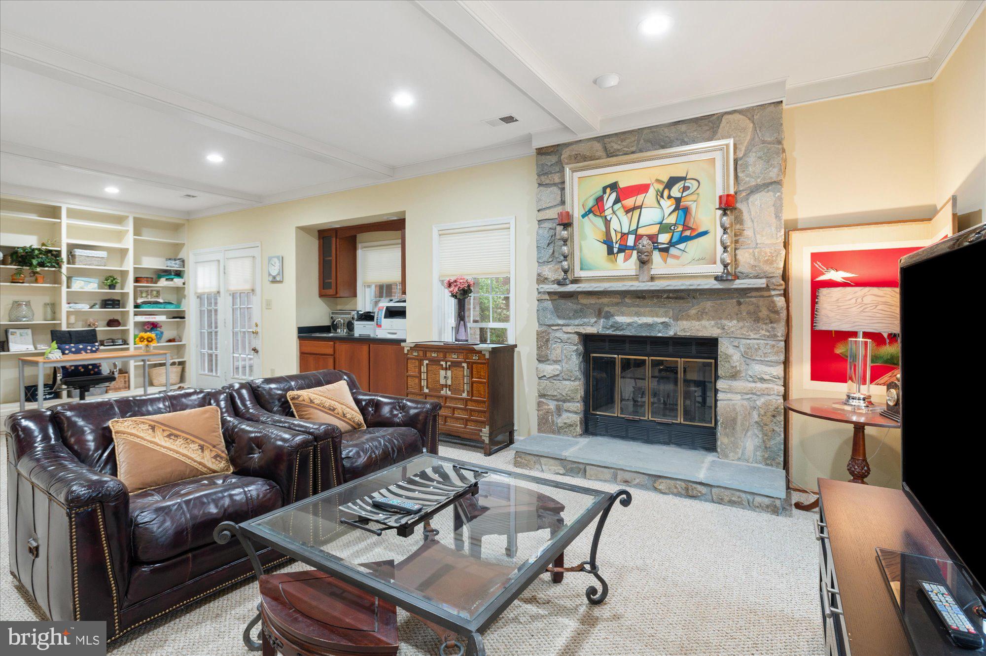 8001 Quarry Ridge Way Bethesda, MD 20817 - Photo 23 of 55 Recreation room with 2 nd Fireplace/ Level Walkout