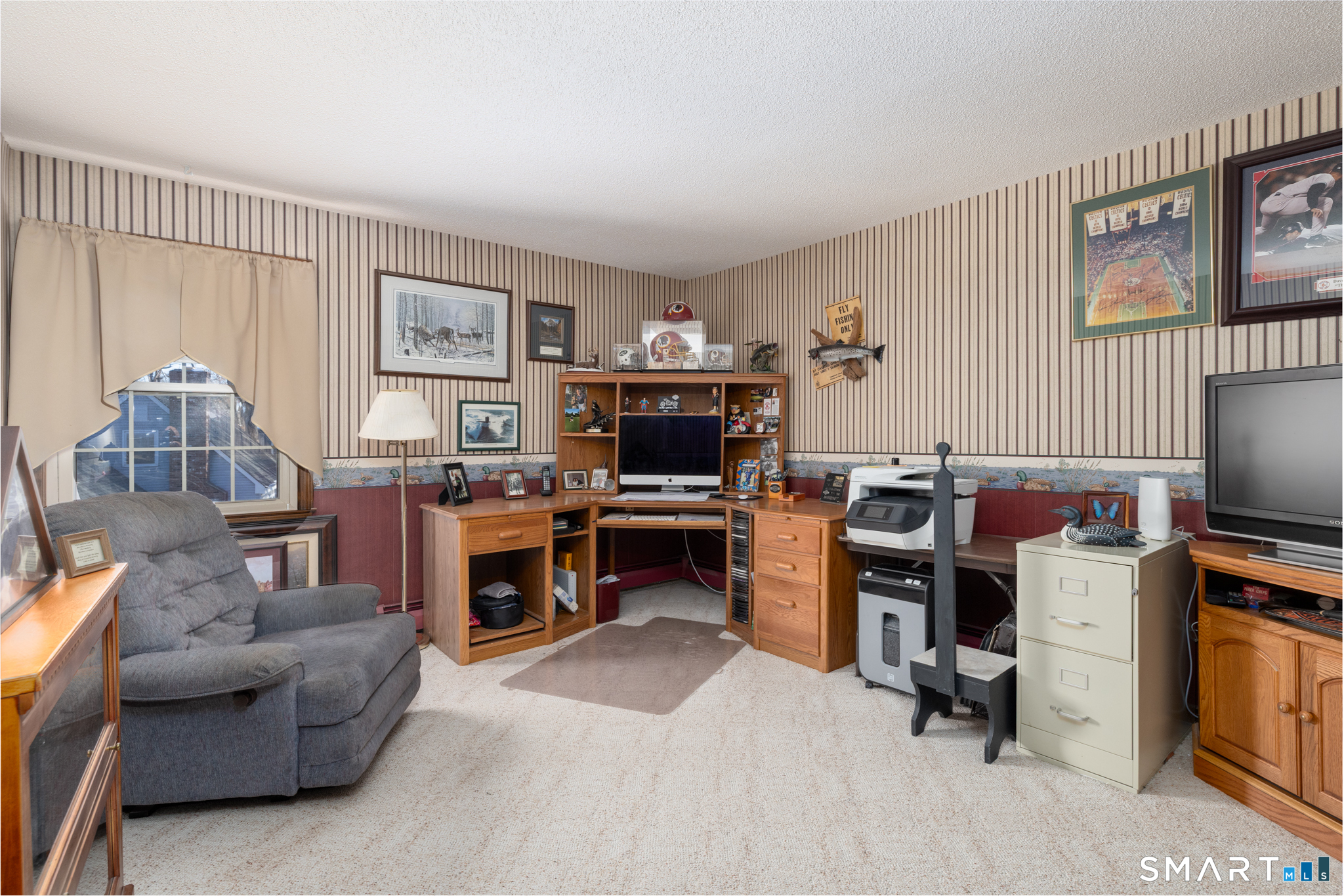 40 November Lane Southington, CT 06479 - Photo 16 of 33 a living room with furniture and a flat screen tv