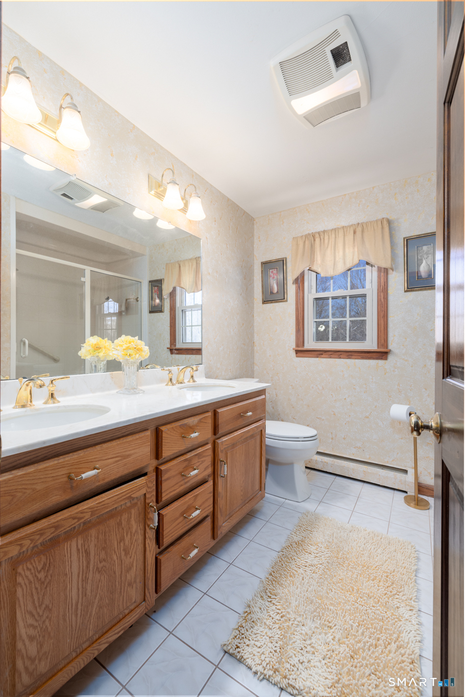 40 November Lane Southington, CT 06479 - Photo 18 of 33 a spacious bathroom with a granite countertop double vanity sink a mirror and a