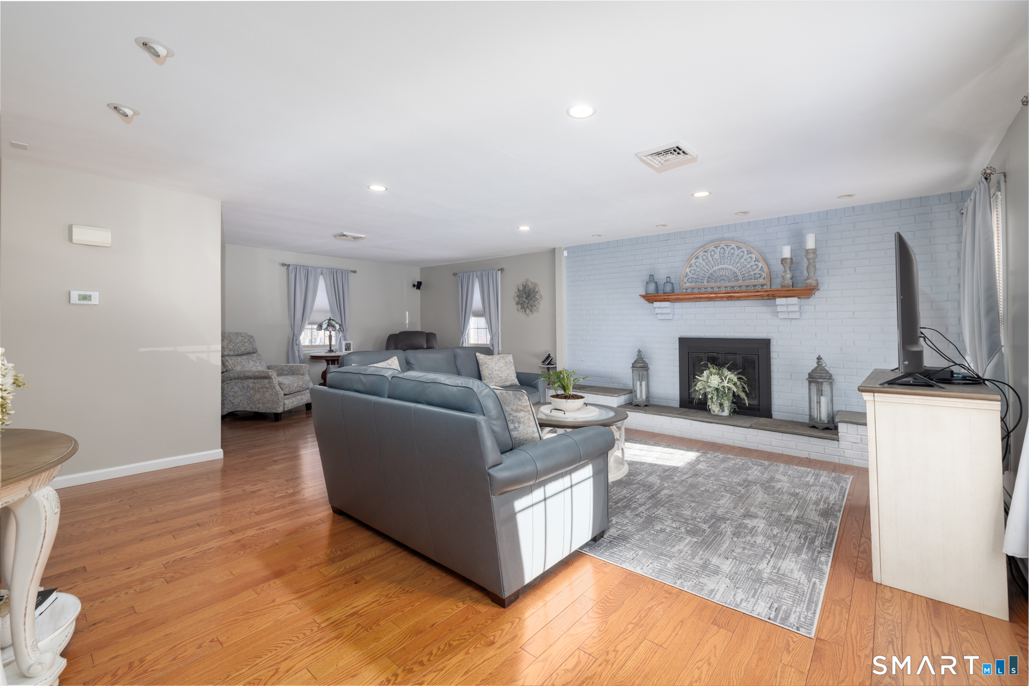 40 November Lane Southington, CT 06479 - Photo 6 of 33 a living room with furniture and a fireplace