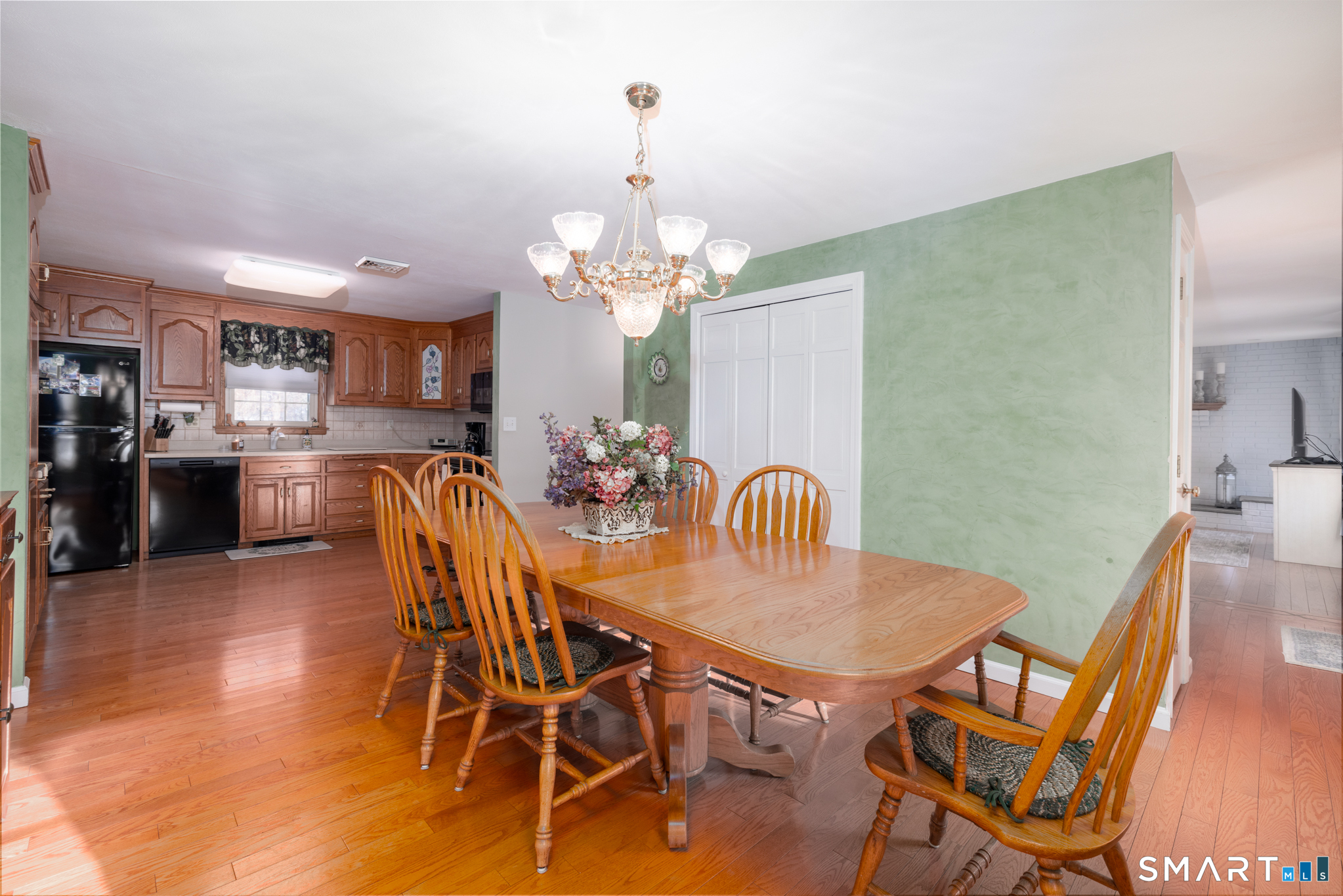 40 November Lane Southington, CT 06479 - Photo 9 of 33 a view of a dining room with furniture and wooden floor