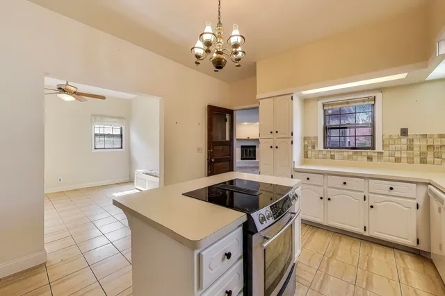 a view of balcony with wooden floor and outdoor seating