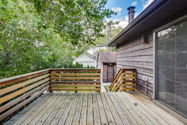 a bathroom with a sink vanity and a mirror