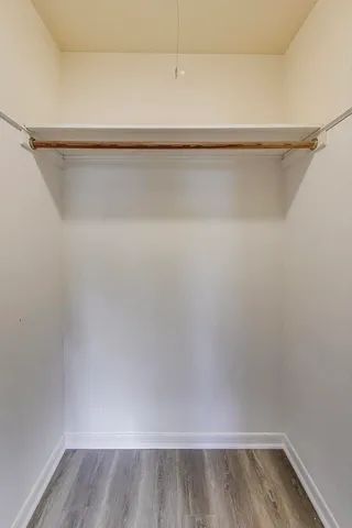 a view of a backyard with a table and chair