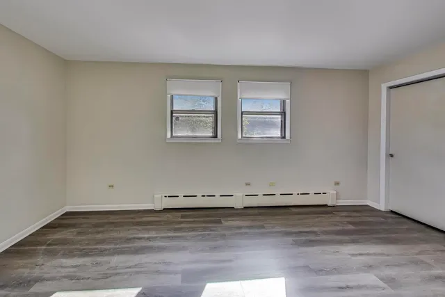 a front view of a house with a garage