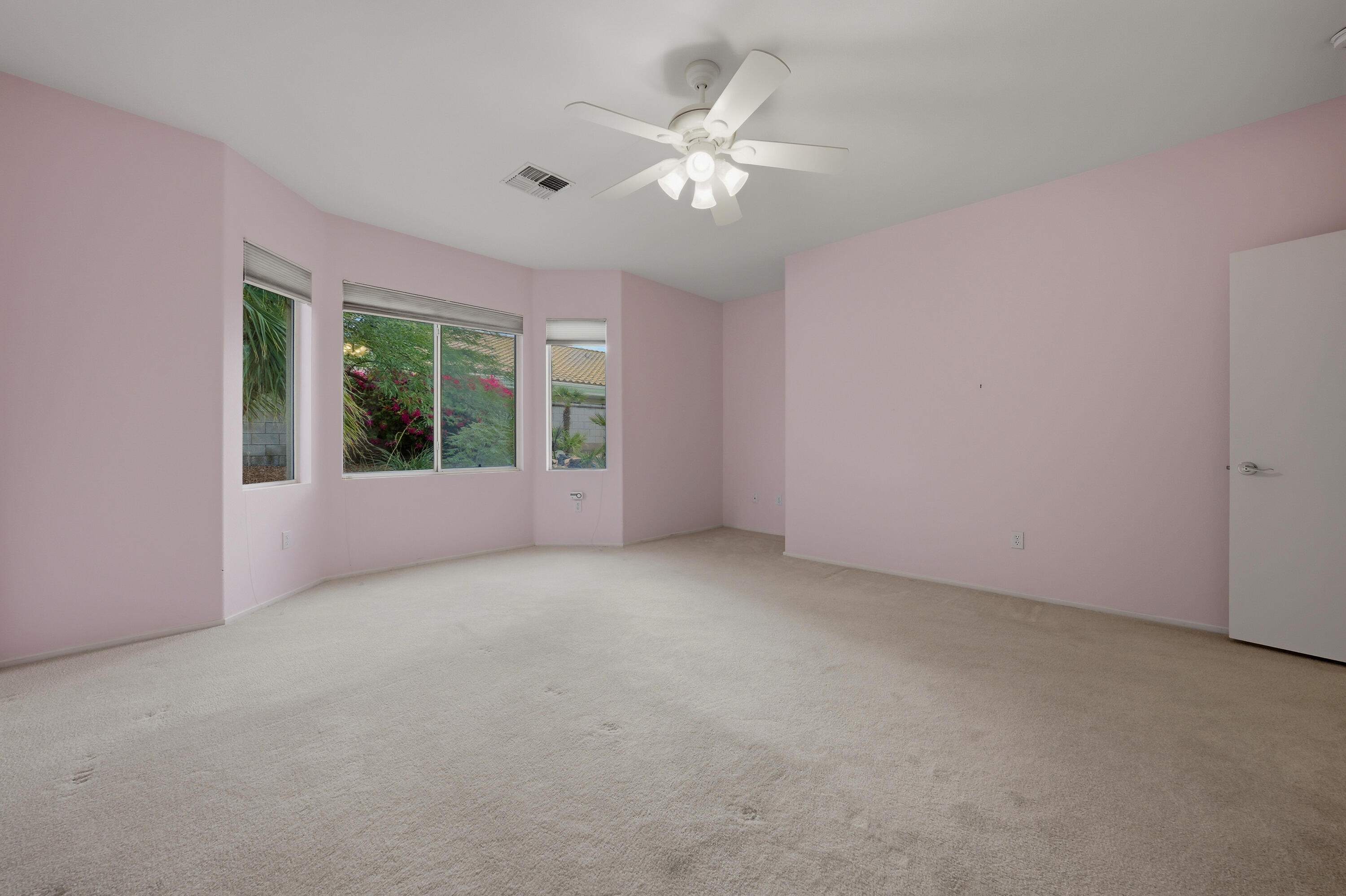 37410 Medjool Avenue Palm Desert, CA 92211 - Photo 22 of 32 a view of an empty room with a window