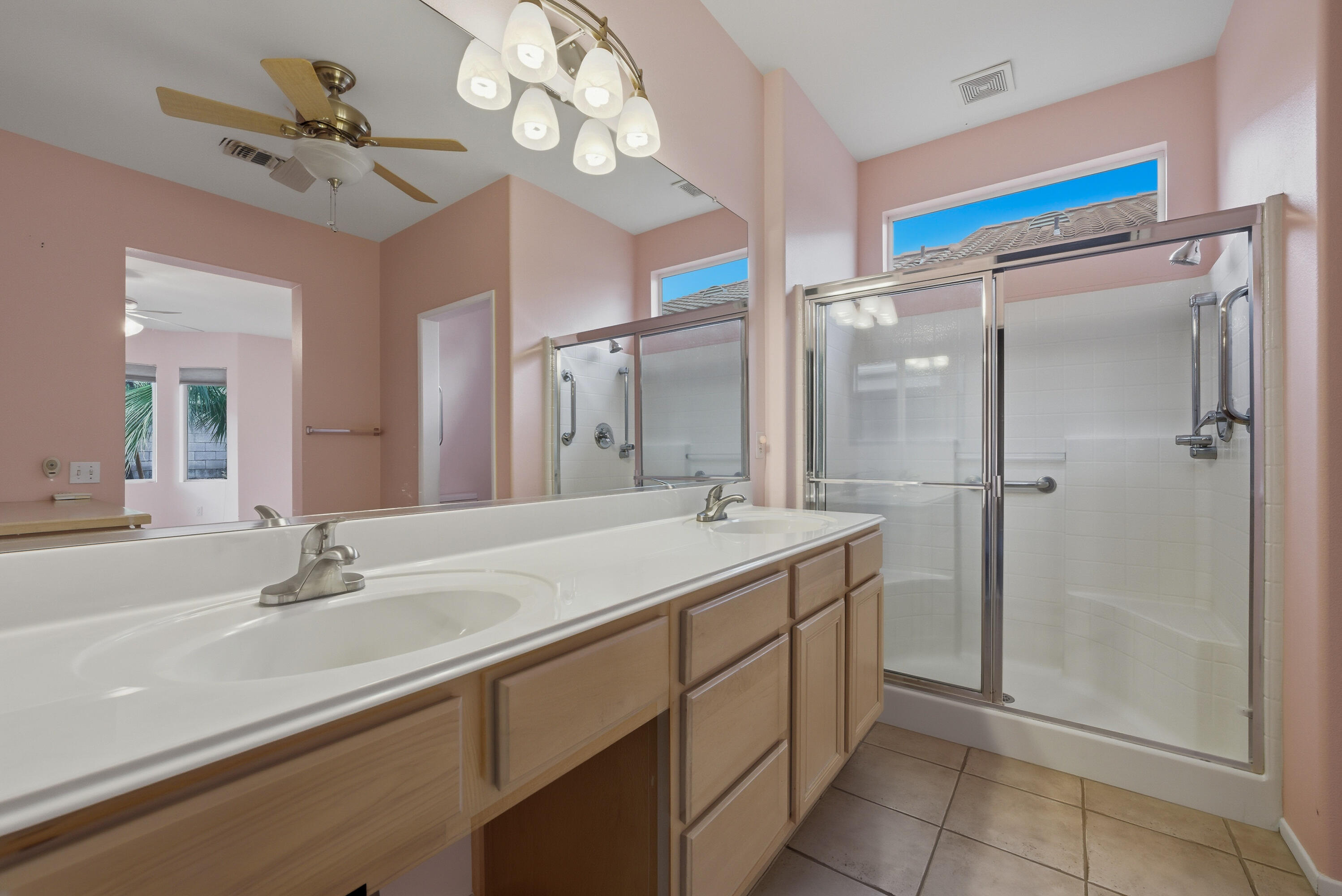 37410 Medjool Avenue Palm Desert, CA 92211 - Photo 25 of 32 a bathroom with a sink vanity granite shower and a mirror