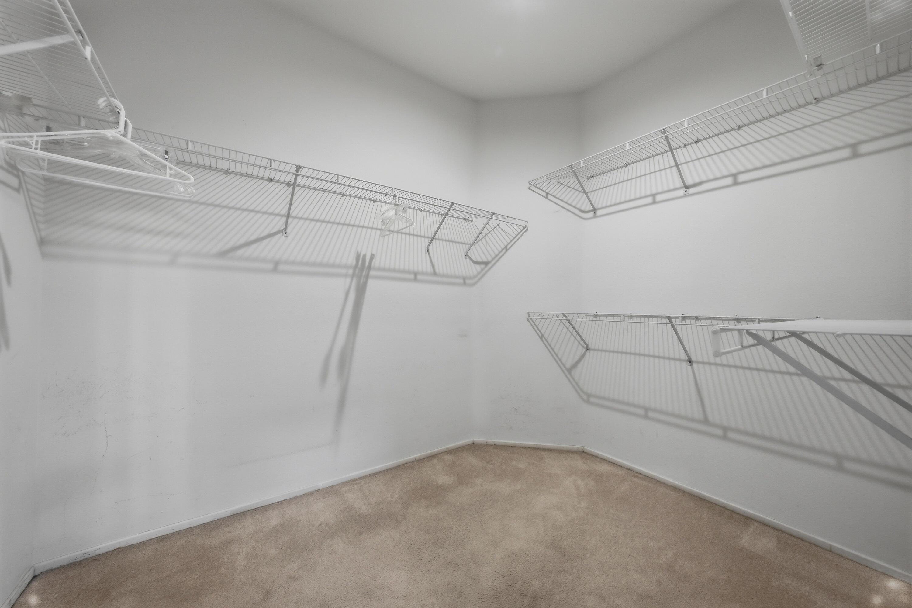 37410 Medjool Avenue Palm Desert, CA 92211 - Photo 26 of 32 a view of a room with racks on the wall