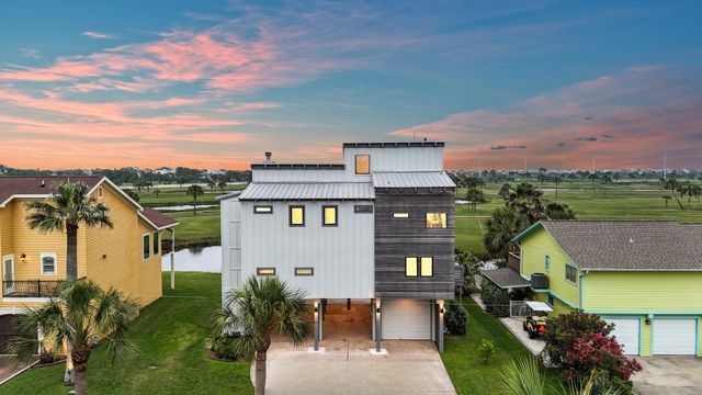 a view of swimming pool with outdoor seating