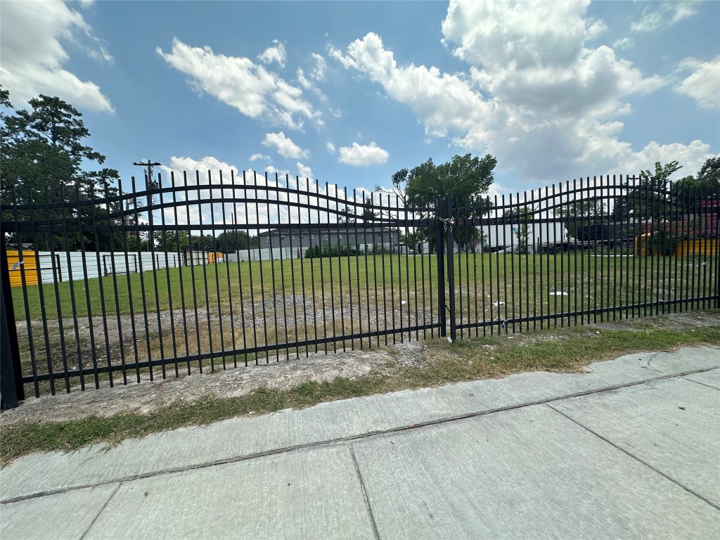 6514 Laura Koppe Road Houston, TX 77016 - Photo 2 of 6 a view of a wrought iron fences in front of house