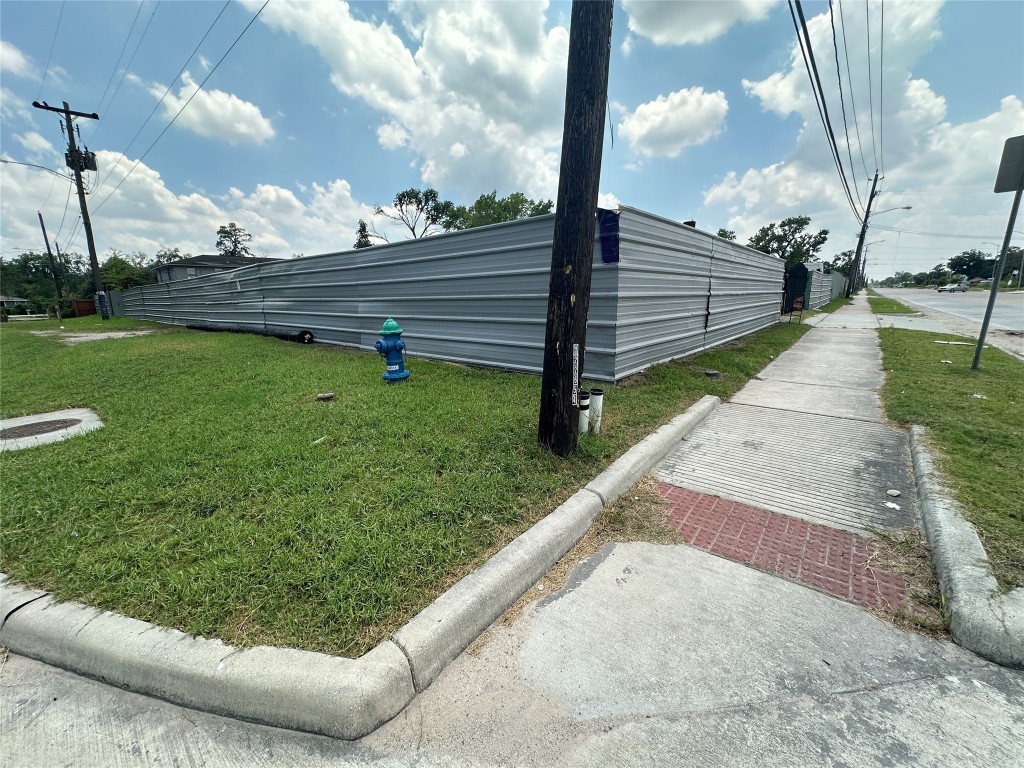 6514 Laura Koppe Road Houston, TX 77016 - Photo 5 of 6 a view of a back yard of the house and a park