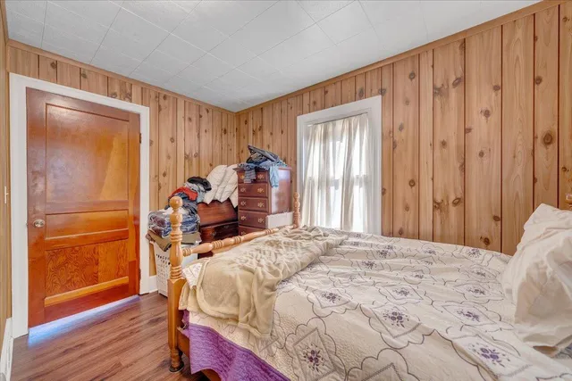 a bathroom with a shower and a sink