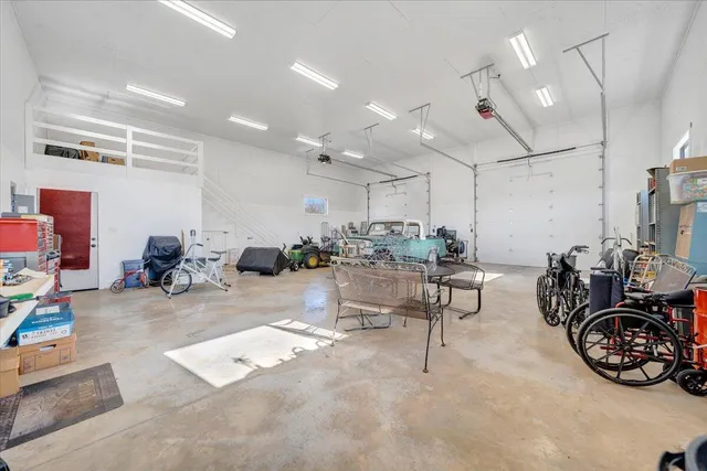 a living room with lots of furniture and a view