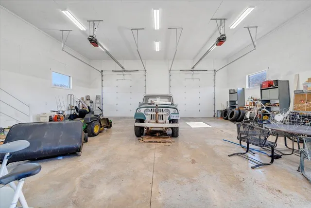 a bed room with a bed and a window