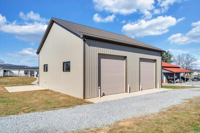 a view of an empty room with closet