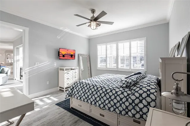 a bathroom with a glass shower door and a bathtub