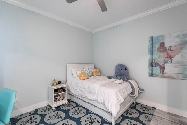 a bathroom with a toilet sink and a mirror