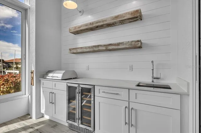 a view of a balcony with chairs