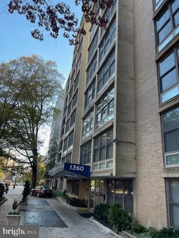a street sign on a brick building