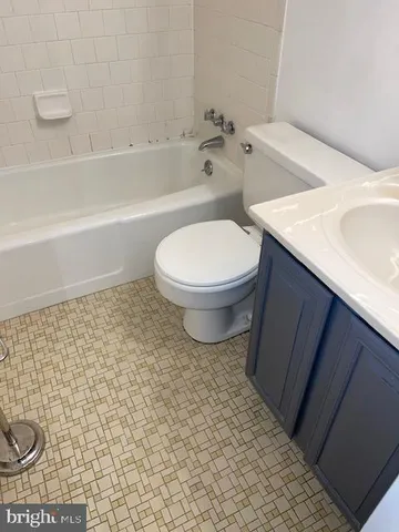 a view of a patio with plants and trees