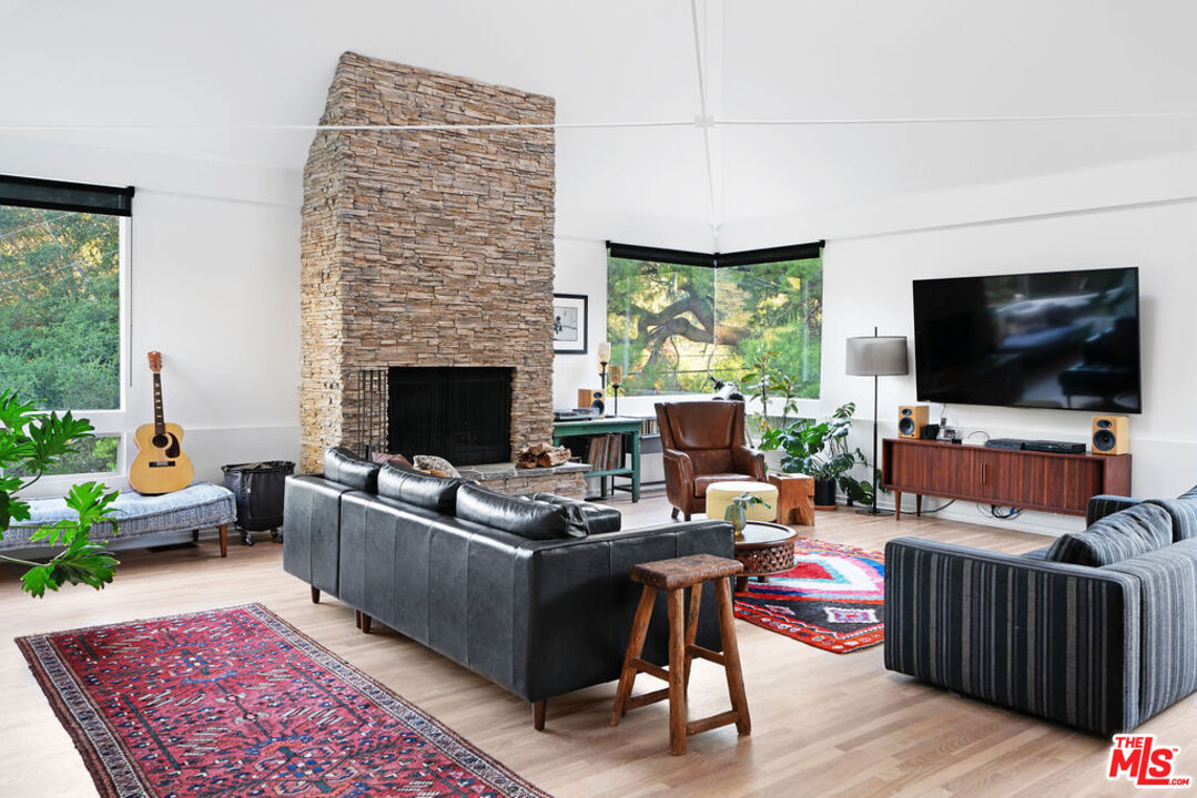25761 Vista Verde Drive Calabasas, CA 91302 - Photo 5 of 22 a living room with furniture and a flat screen tv