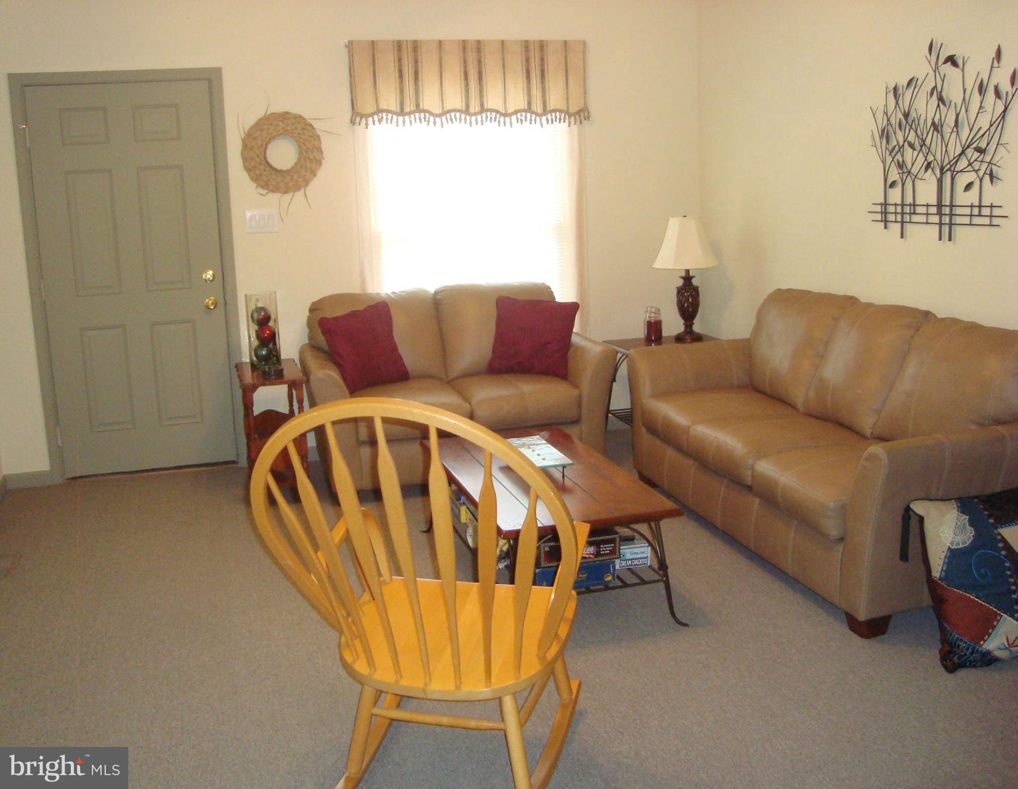 1901 Wilson Road White Hall, MD 21161 - Photo 14 of 26 a living room with furniture and a window