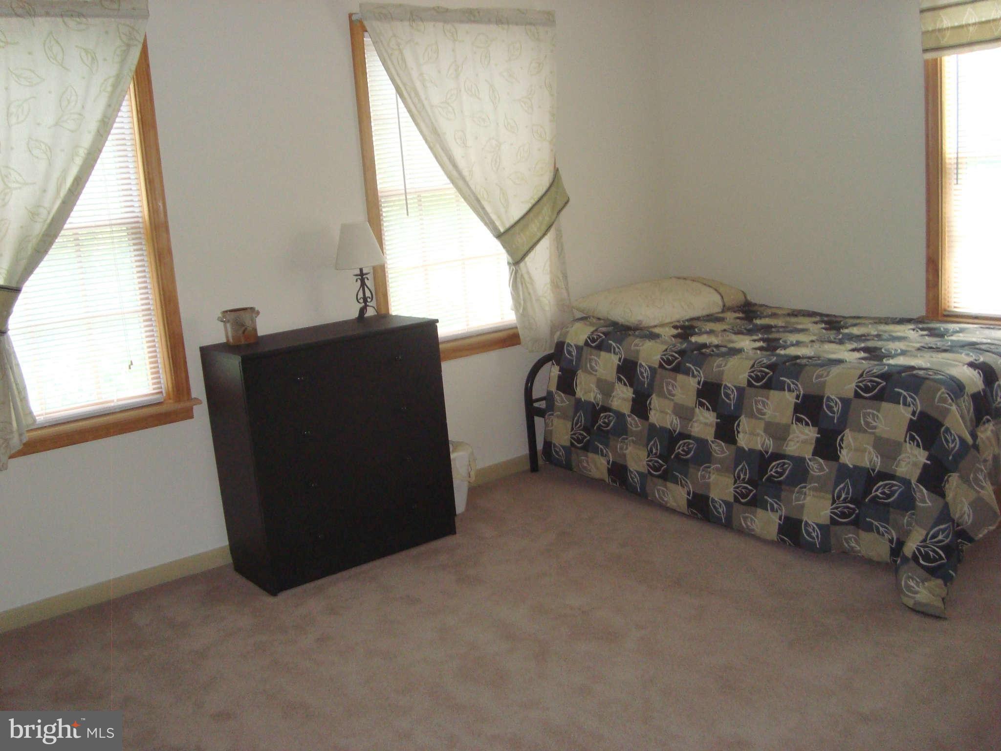 1901 Wilson Road White Hall, MD 21161 - Photo 22 of 26 a bedroom with a bed and a window