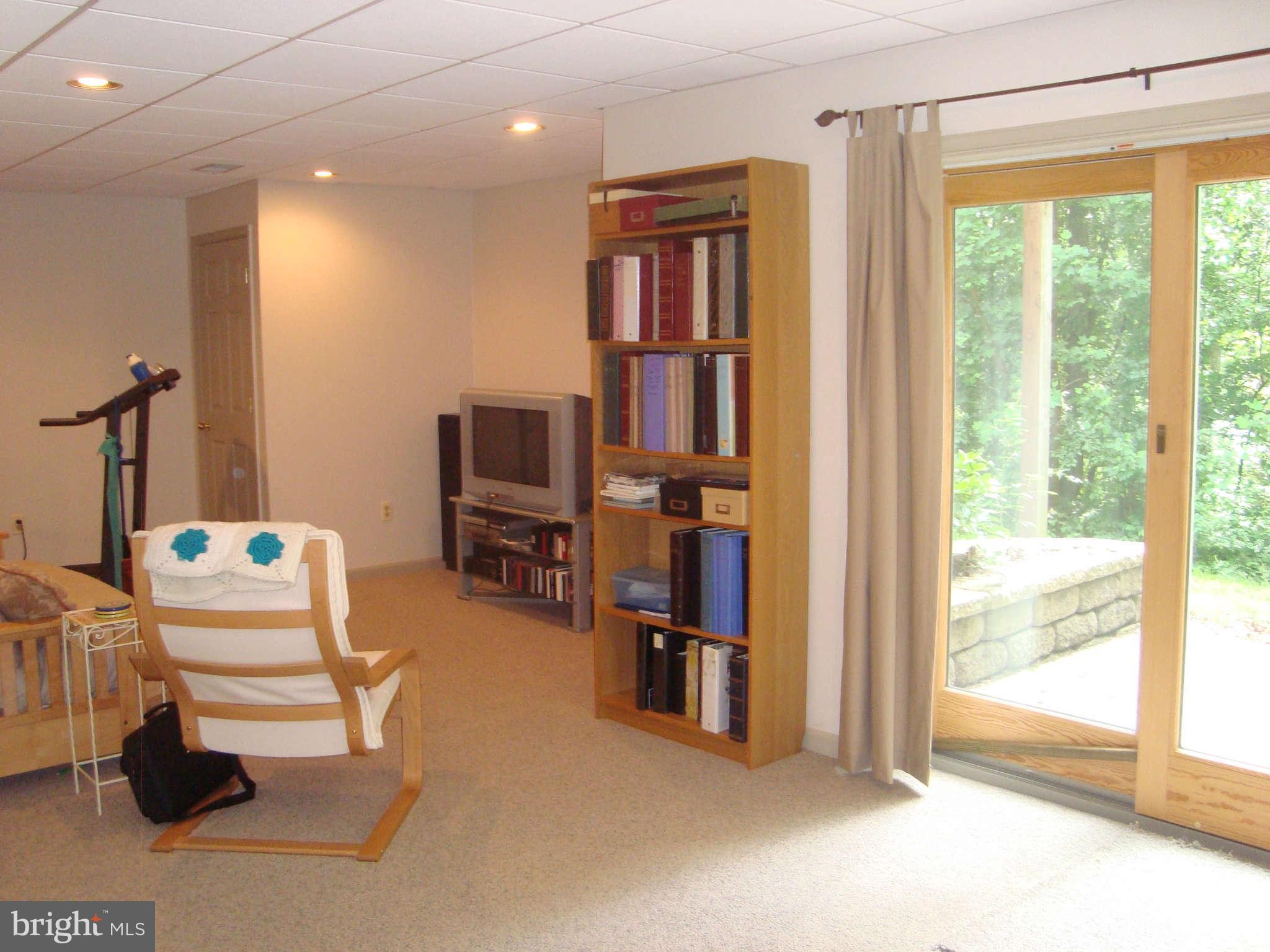 1901 Wilson Road White Hall, MD 21161 - Photo 25 of 26 a room with furniture a rug and a window