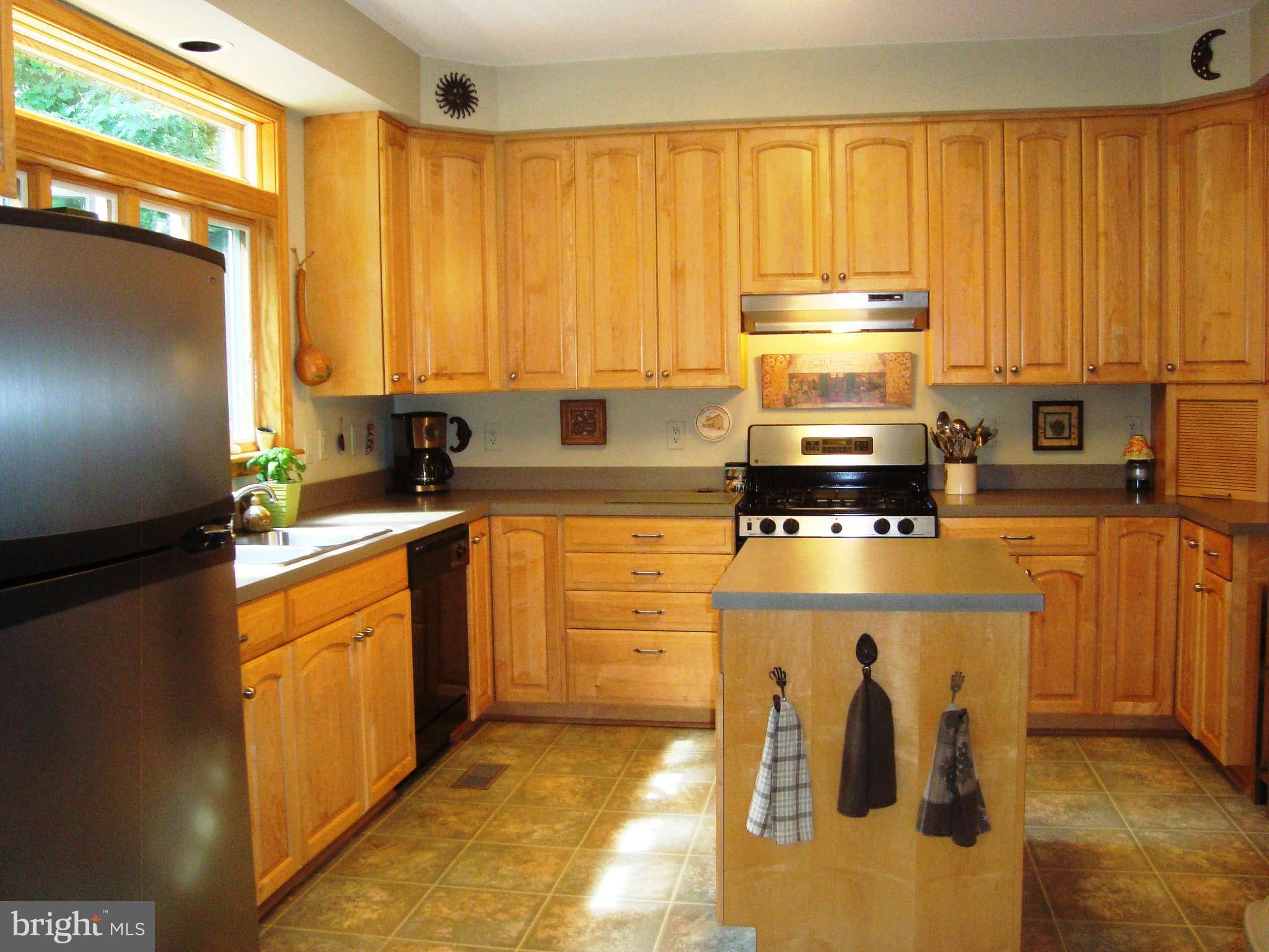 1901 Wilson Road White Hall, MD 21161 - Photo 8 of 26 a kitchen with appliances cabinets and a sink