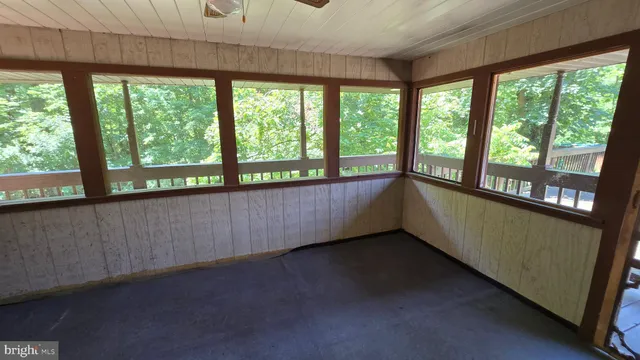 a kitchen with a refrigerator and a stove
