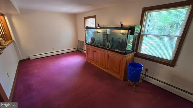 a view of a livingroom with furniture