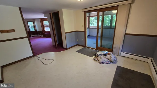 an empty room with windows