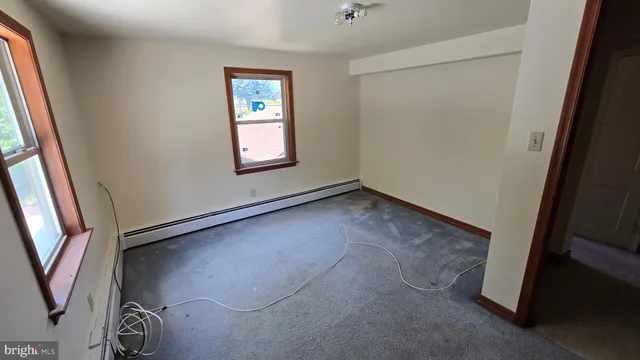 a view of a hallway with closet