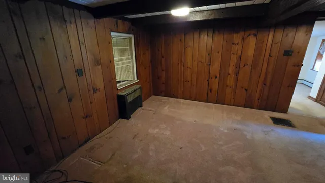 a bathroom with a sink a vanity and a large mirror