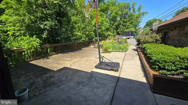 a view of a chairs and table in the balcony