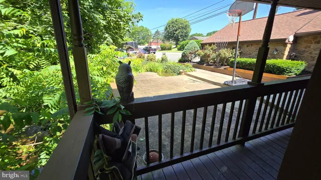 a view of balcony with wooden floor and outdoor space