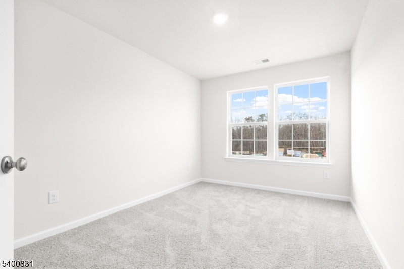 175 Mantoloking Drive Jackson, NJ 08527 - Photo 15 of 25 an empty room with a window